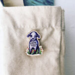 "Eating babies is weird" wooden pin badge - Image 2