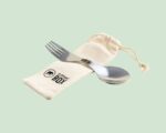 Metal spork on top of drawstring cotton bag