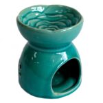 image of back of teal blue tree of life oil burner
