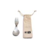 Metal spork next to drawstring beige colour cotton bag
