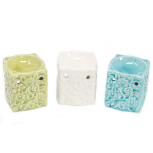 Trio of green, white and blue small square oil burners