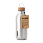 Steel bottle with cork lid and metal carry/hanging loop. Brown cardboard tag attached.