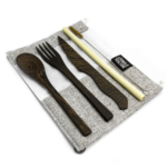Grey cutlery roll open with dark wood cutlery, bamboo straw & coconut fibre cleaning brush inside