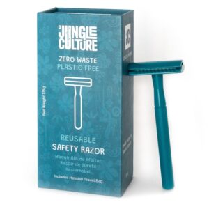 Teal metal safety razor beside gift box