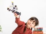 Child playing with PlayPress Space ranger