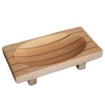 Very pleasing wooden soap dish which is oblong with a carved dip for soap, slots for drainage and small wooden feet