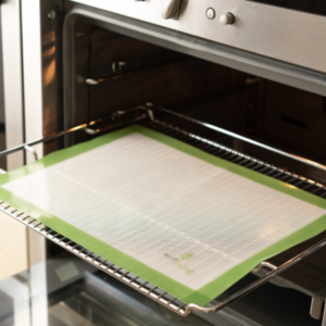 Example of silicone baking liner in use, on an oven shelf filling the entire shelf.