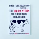 Front cover of The Angry Vegan Colouring Book and Journal with image of a cow