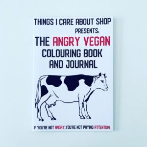 Front cover of The Angry Vegan Colouring Book and Journal with image of a cow