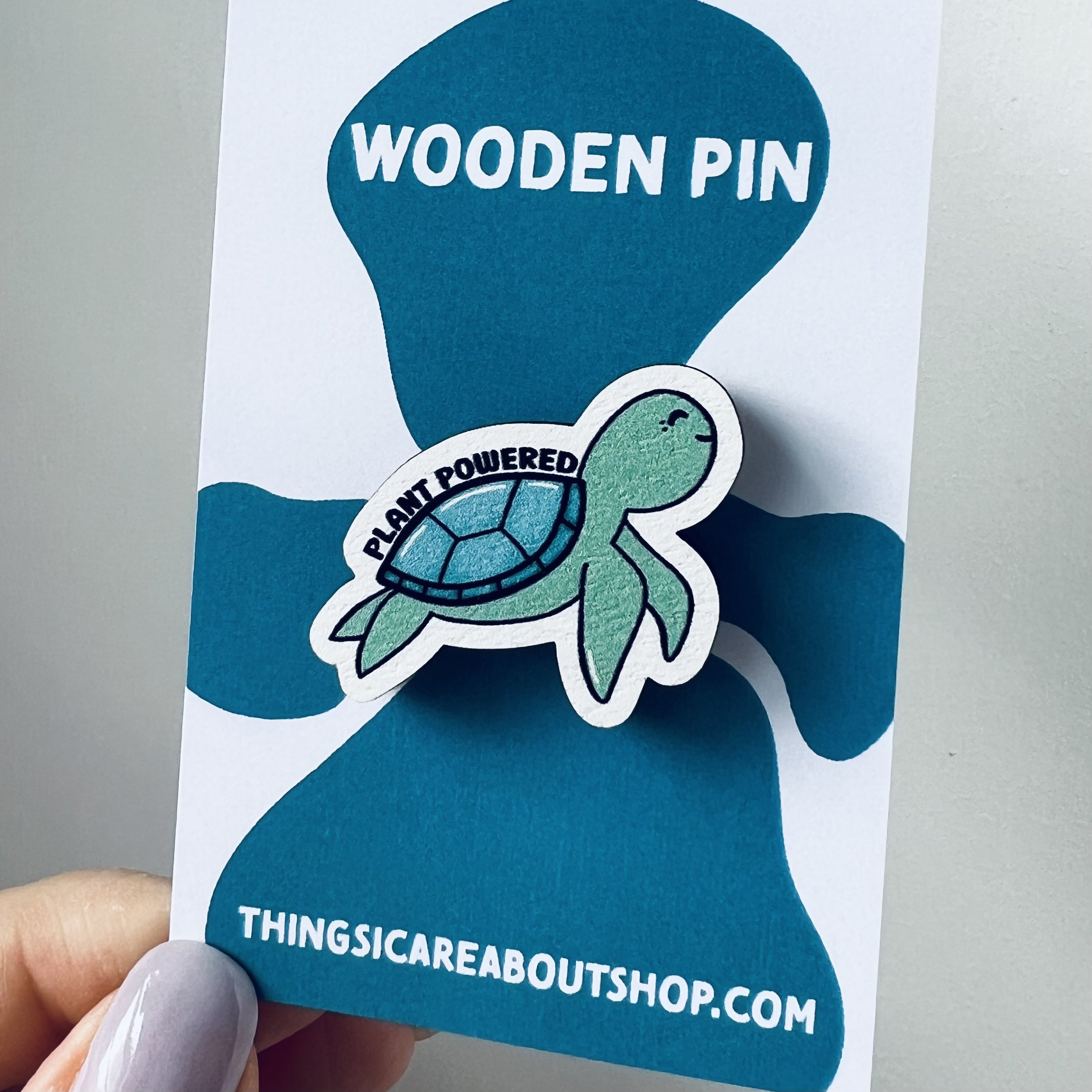 Plant Powered turtle wooden pin. Vegan pin. Sea Turtle Plant Powered Wooden Pin. Blue content looking sea turtle design