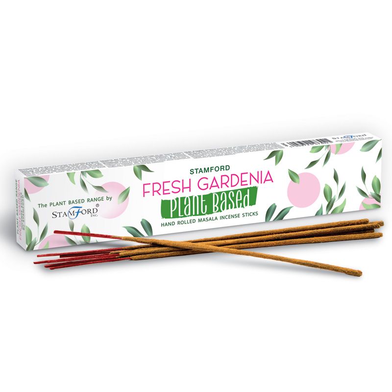 fresh gardenia incense sticks Attractive white box with small green leaves and pink gardenia pattern containing plant based incense sticks, some of the incense sticks are in front of the box on display.