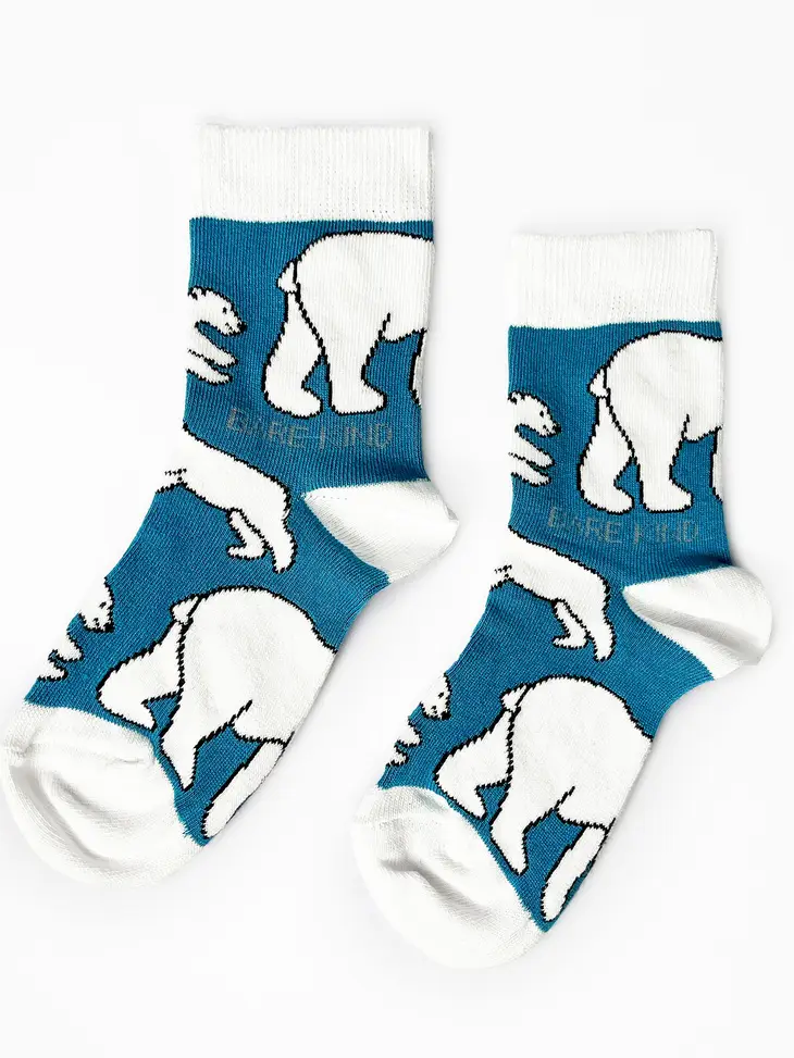 842168e6b0b9b49cef732e037b4843c3455079dd5f8893d0e5310e0feab281c0 Two socks with white ribs, toes and heels, pale blue with white polar bears all over.