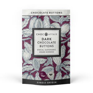 Dark chocolate vegan buttons in a paper pouch with attractive cacao beans design on.